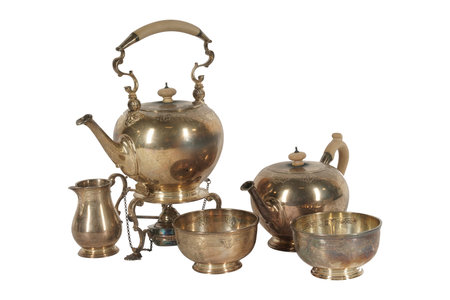 Antique brass tea set isolated on white background with clipping path.の写真素材