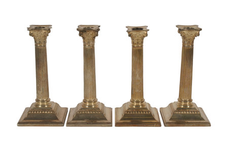 antique bronze column isolated on white background, clipping path included.の写真素材