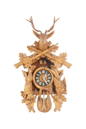 Wooden clock in the shape of a deer on a white backgroundの写真素材