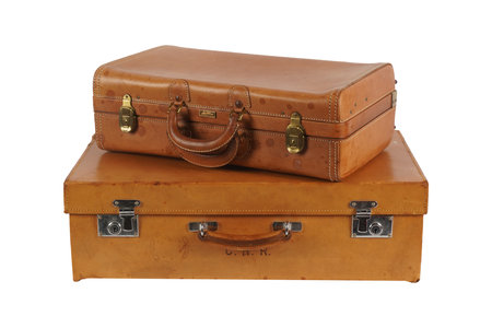 Two vintage suitcases isolated on a white background. Clipping path included.の写真素材