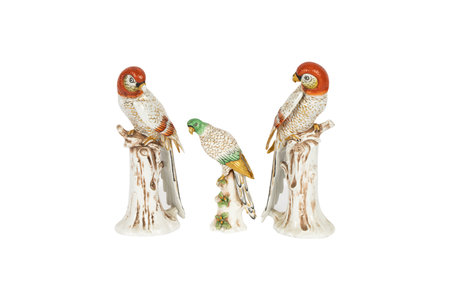 Porcelain statuettes of birds on a white backgroundの写真素材