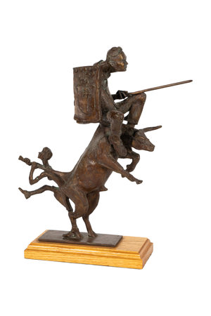 Bronze statue of a knight with a spear on a white backgroundの写真素材