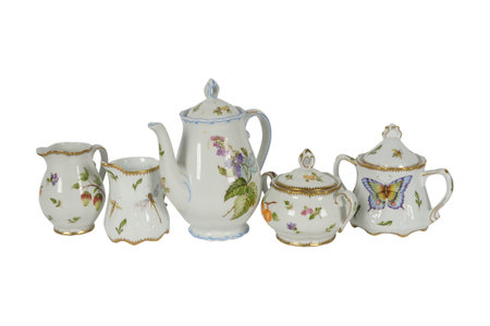 Antique porcelain teapot isolated on white background.の写真素材