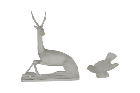 Ceramic statuette of a deer on a white backgroundの写真素材