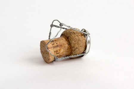 Champagne bottle cork on white backgroundの写真素材