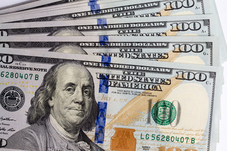Bundle of one hundred American dollars banknotesの写真素材