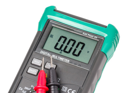 Digital multimeter with laying probes isolated on white