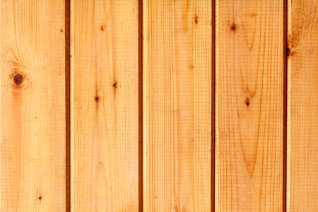 Yellow wall made of wooden planks textureの写真素材