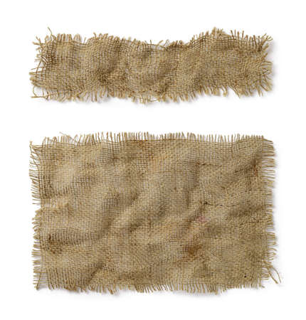 Crumpled burlap rectangular and oblong pieces isolated on white background. Natural color sackcloth...