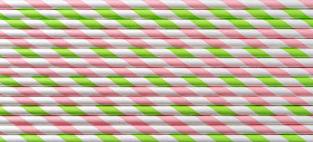 Disposable pink green striped cocktail straws horizontal texture. Macro background of paper striped...
