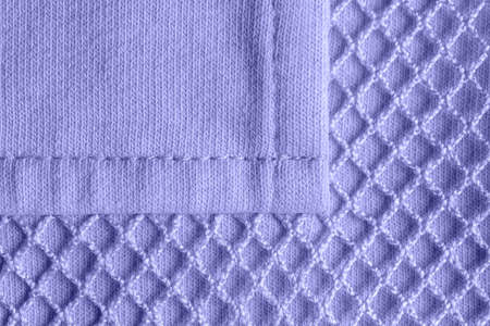 Burlap fabric with torn edges background. Macro texture of coarsely woven sackcloth of hemp, jute or...