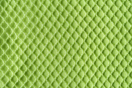 Burlap fabric with torn edges background. Macro texture of coarsely woven sackcloth of hemp, jute or...