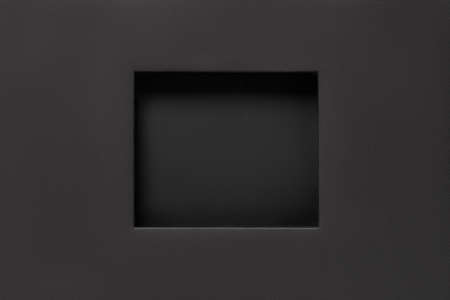 Black paper frame with rectangular recess. Abstract cardboard poster mockup. Blank recessed picture...