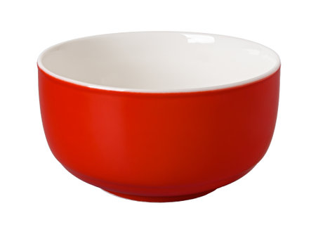 Empty red porcelain bowl cutout. Clean scarlet ramekin isolated on a white background. Clay ceramics porcelain tableware crockery for food design. Front view.の写真素材