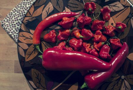 Red chili peppers on white background.
