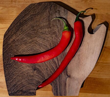 Red chili peppers on white background.の写真素材