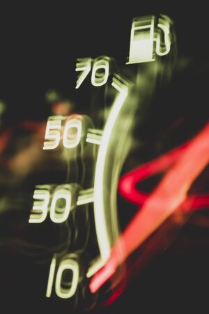 Fuel gauge indicates empty tank, close upの写真素材