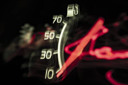 Fuel gauge indicates empty tank, close upの写真素材