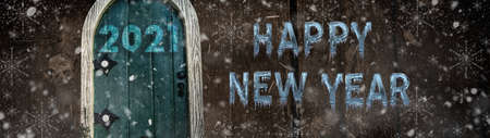 Happy new year 2021 card design. Entrance to the new year. Mery christmas and happy new year 2021. Holiday glowing illustration. Small wooden door in a wooden house. Magic door in a tree.の写真素材
