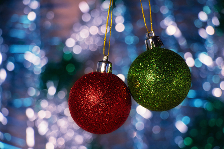 Colored Christmas balls with fir branchesの写真素材