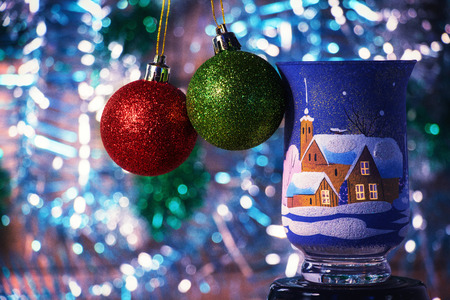 Colored Christmas balls with fir branchesの写真素材
