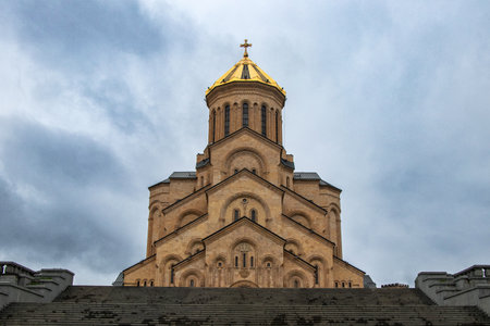 The Holy Trinity Cathedral of Tbilisi, known as Sameba, rises majestically with its golden dome...