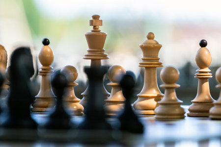 Chess pieces on a chessboard with shallow depth of field.の写真素材