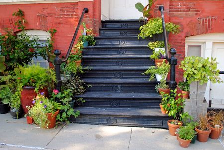 Iron stairway entry to a florist shop in an old building vintage 1800s