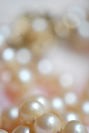 Pearl necklace on lace fabric. Shallow DOFの写真素材