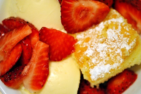 Strawberry shortcake; ice cream, cake, and fresh strawberries 