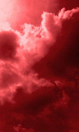 Cloudy sky colorized with crimson effect の写真素材