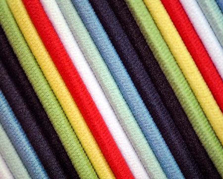 Extreme closeup of elasticized bands for styling long hair; makes interesting abstract striped background の写真素材