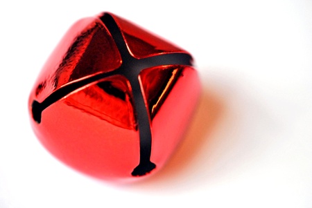 One red jingle bell isolated on a white background 