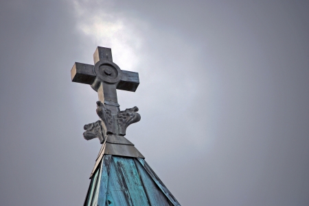 Church steeple topped with cross の写真素材