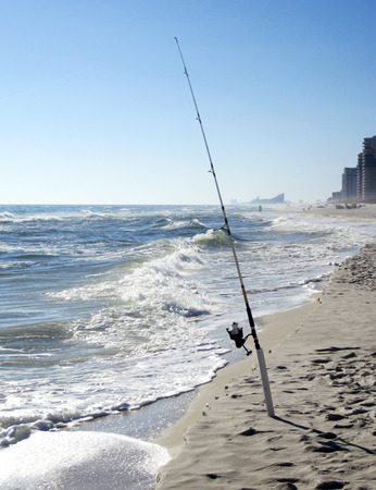 Fishing pole on the beach at Pensacola Beach Floridaの写真素材