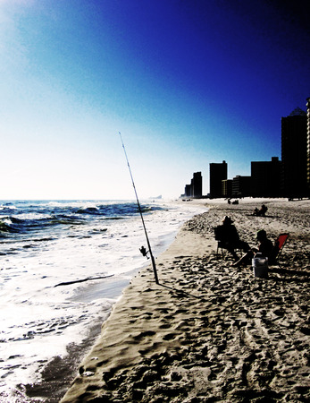 Winter afternoon fishing at Pensacola Beach Florida. Low key effectの写真素材