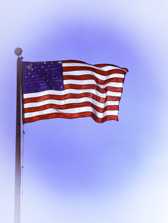Flag of the United States flying in the breeze.の写真素材
