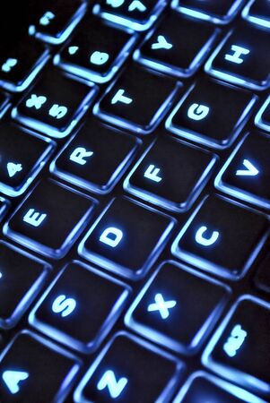 Illuminated computer keyboard closeupの写真素材