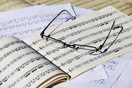 Piano score and glassesの写真素材