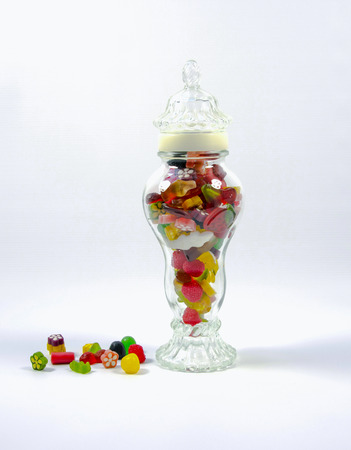 Candies in a potの写真素材