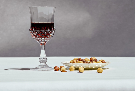 Aperitif wine and nutsの写真素材