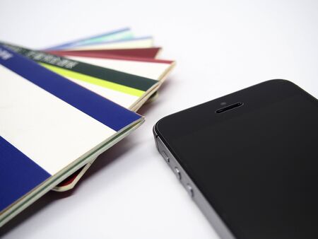 Passbook and smartphoneの写真素材