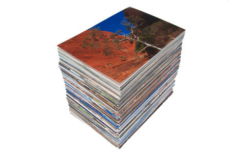 a stack of photos printed on photo paperの写真素材