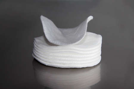 Diskettes lever makeup, cotton round, gray background, whiteの写真素材