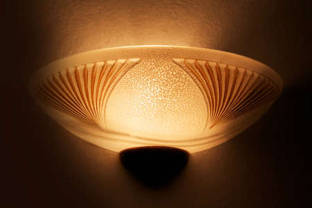 a warm glow with warm yellow walls of its ownの写真素材