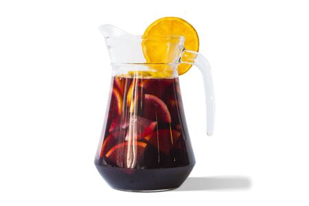 Refreshing sangria fruit punch beverage in glass pitcherの写真素材