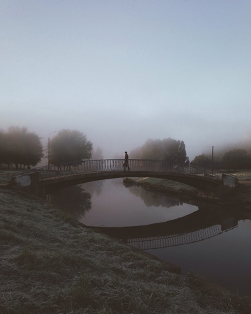 Man crossing on the bridgeの素材