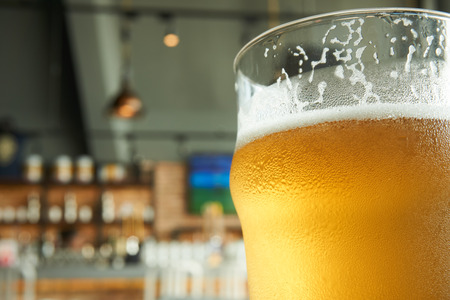 beer glass in restaurantの写真素材