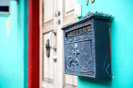 unique mail letter box against the wallの写真素材