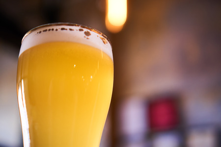 glass of cold beer in the pubの写真素材